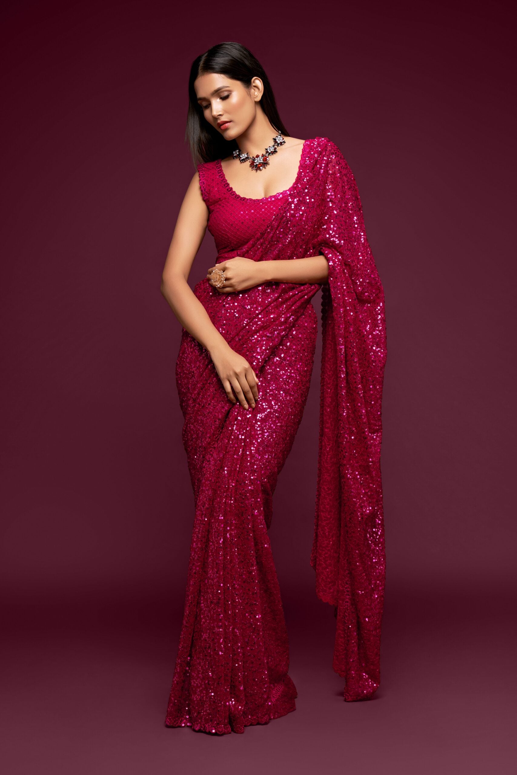Glamorous Magenta Hot Pink Saree with Intricate Thread Embroidery and All-Over Sequin Embellishments
