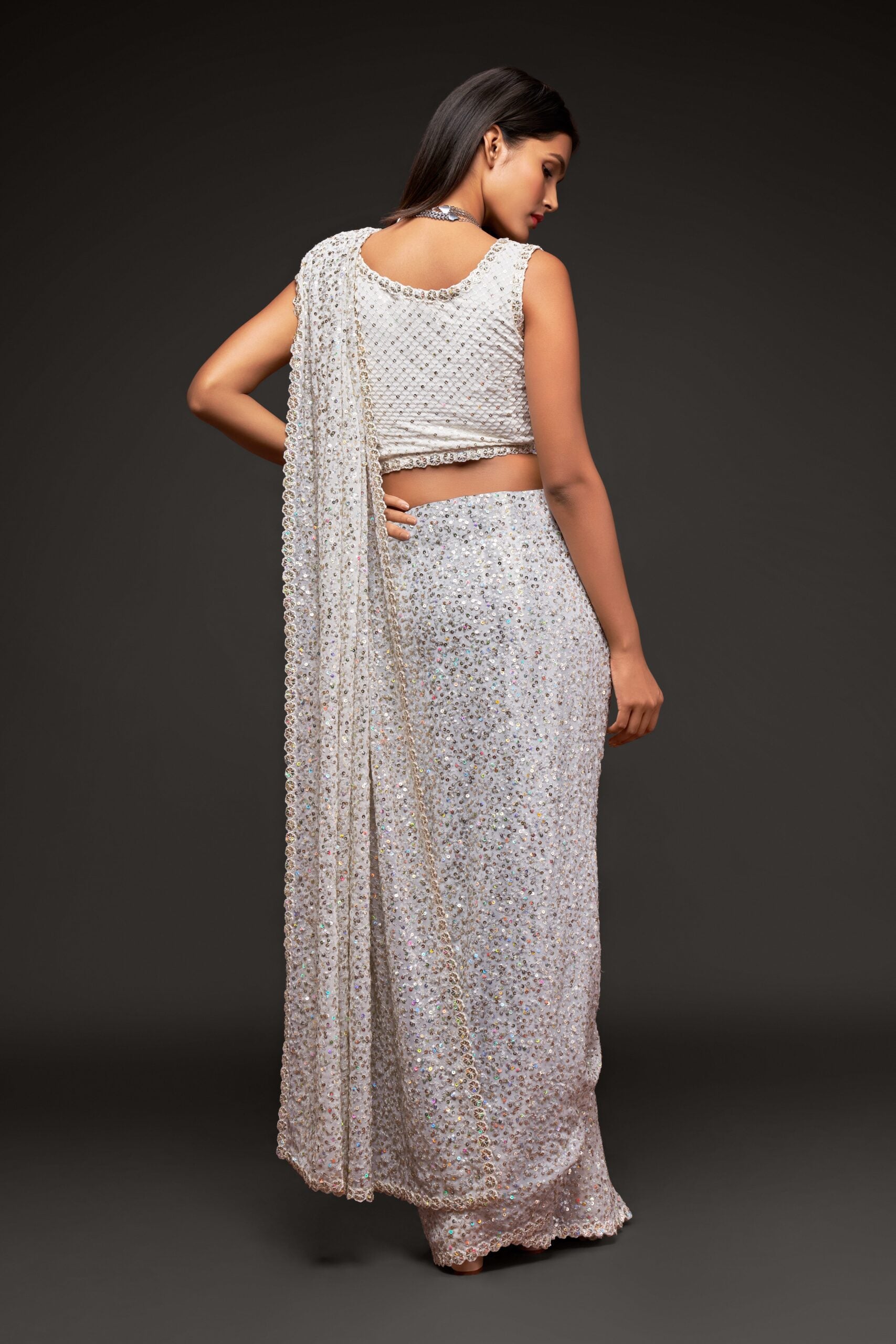 Pearl White Saree with All-Over Thread Embroidery and Shimmering Sequin Highlights