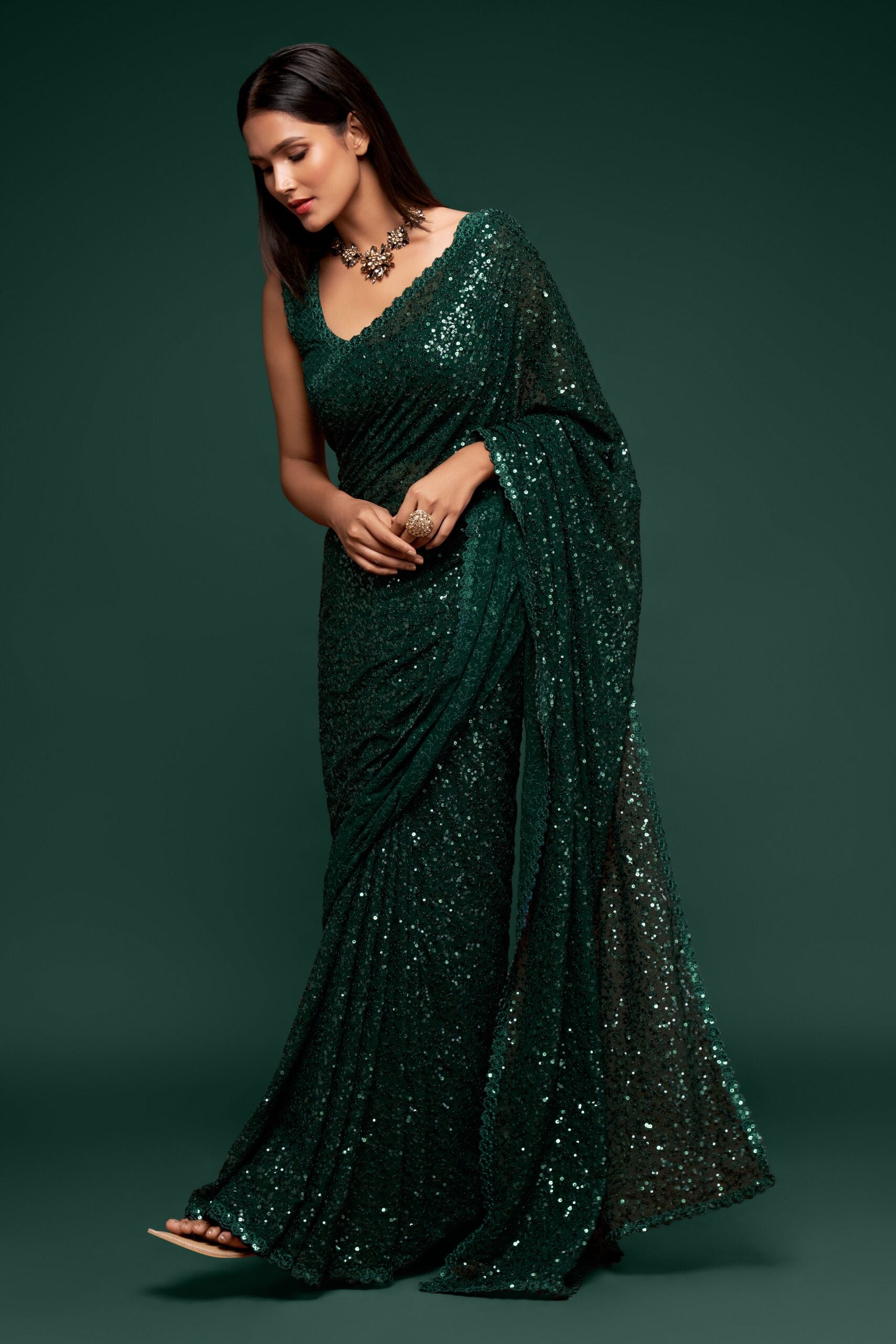 Deep Green Saree with Subtle Thread Embroidery and Dainty Sequin Embellishments