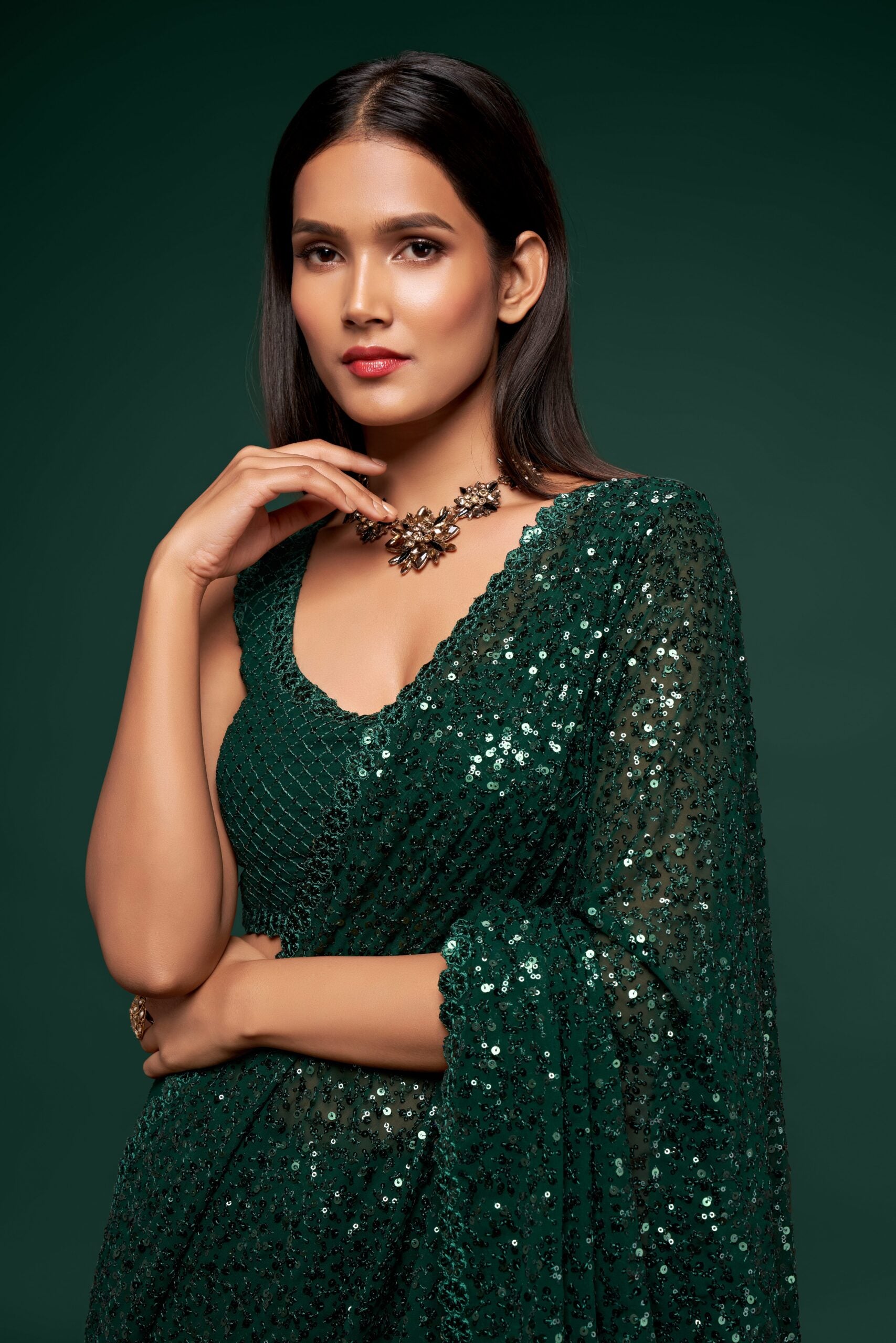 Deep Green Saree with Subtle Thread Embroidery and Dainty Sequin Embellishments