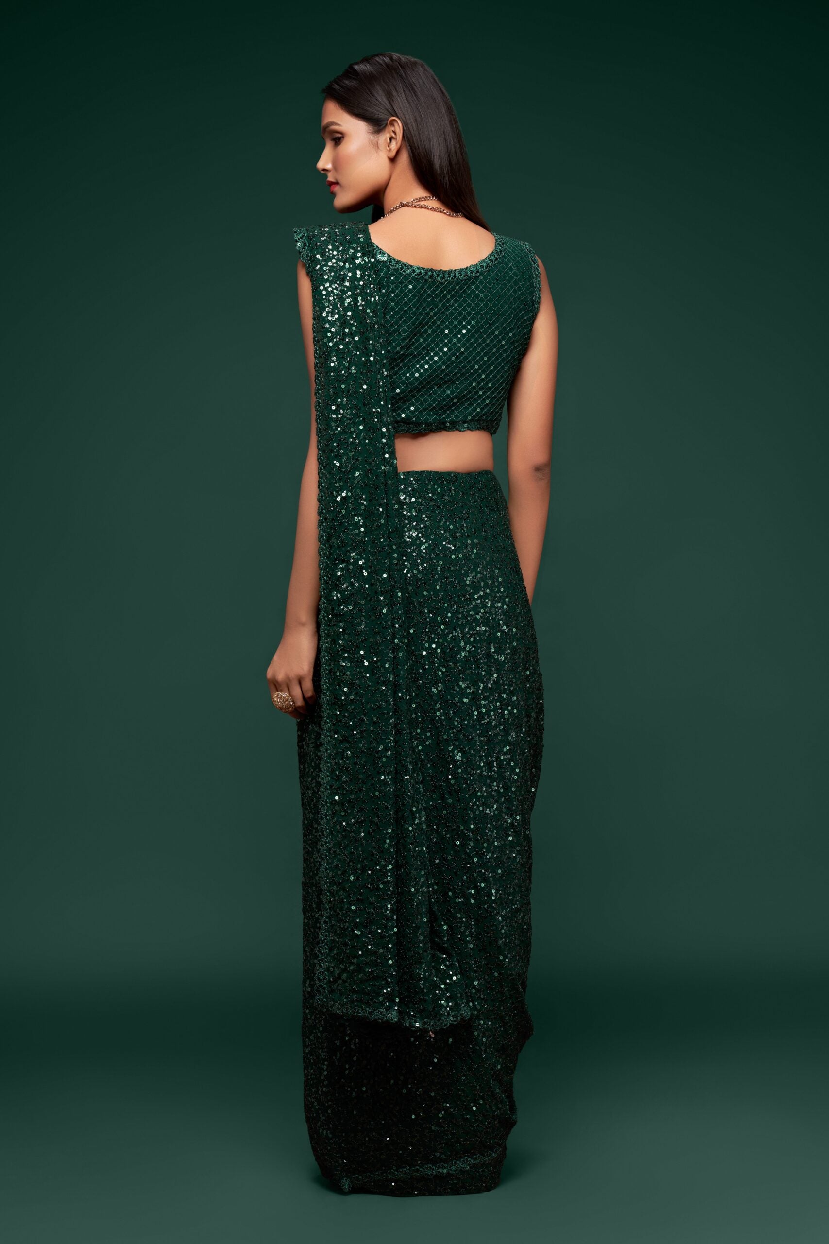 Deep Green Saree with Subtle Thread Embroidery and Dainty Sequin Embellishments