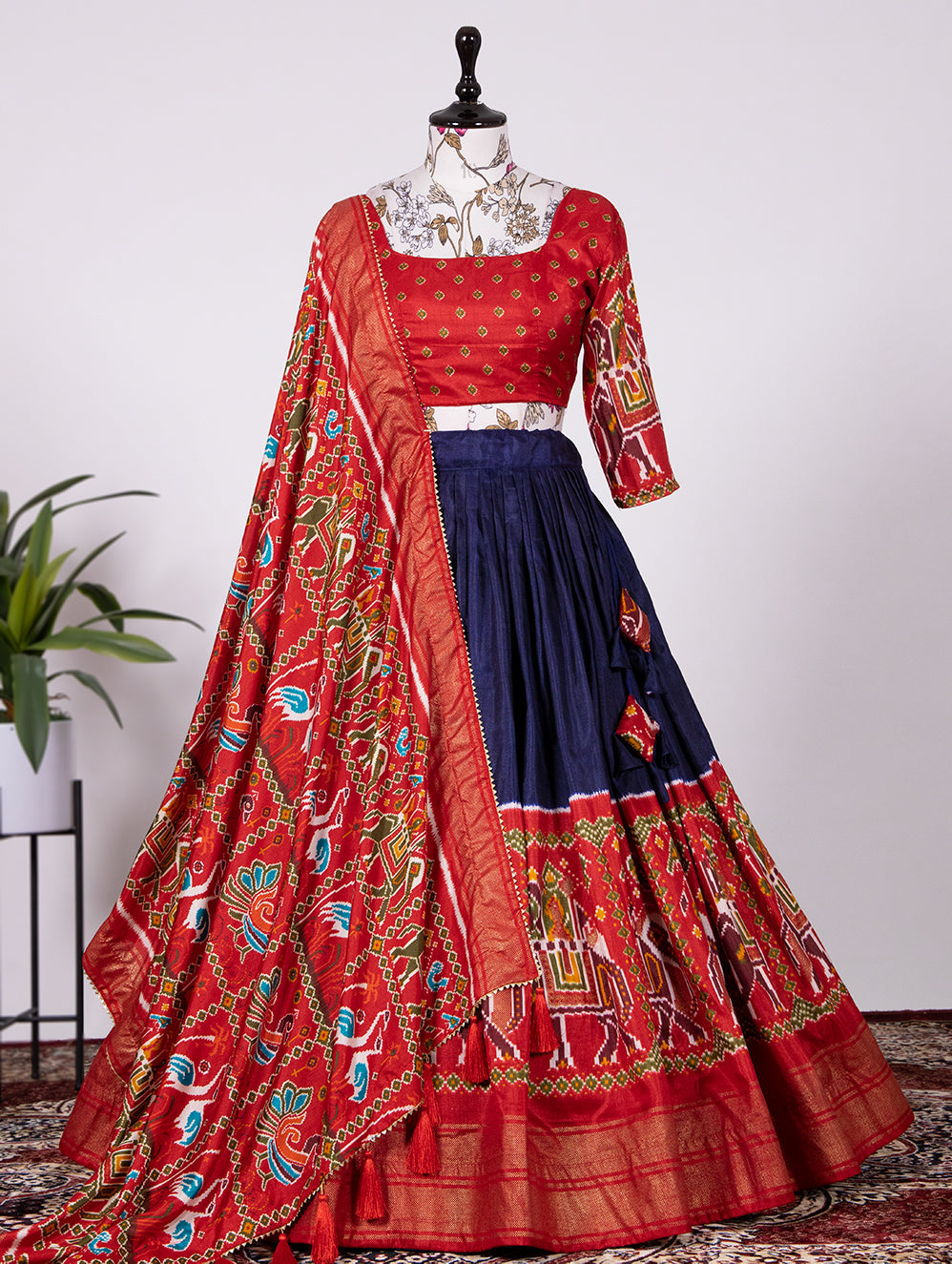 Nilaabha Navy Charisma Dola Silk Patola Print Lehenga Choli in Captivating Navy Blue