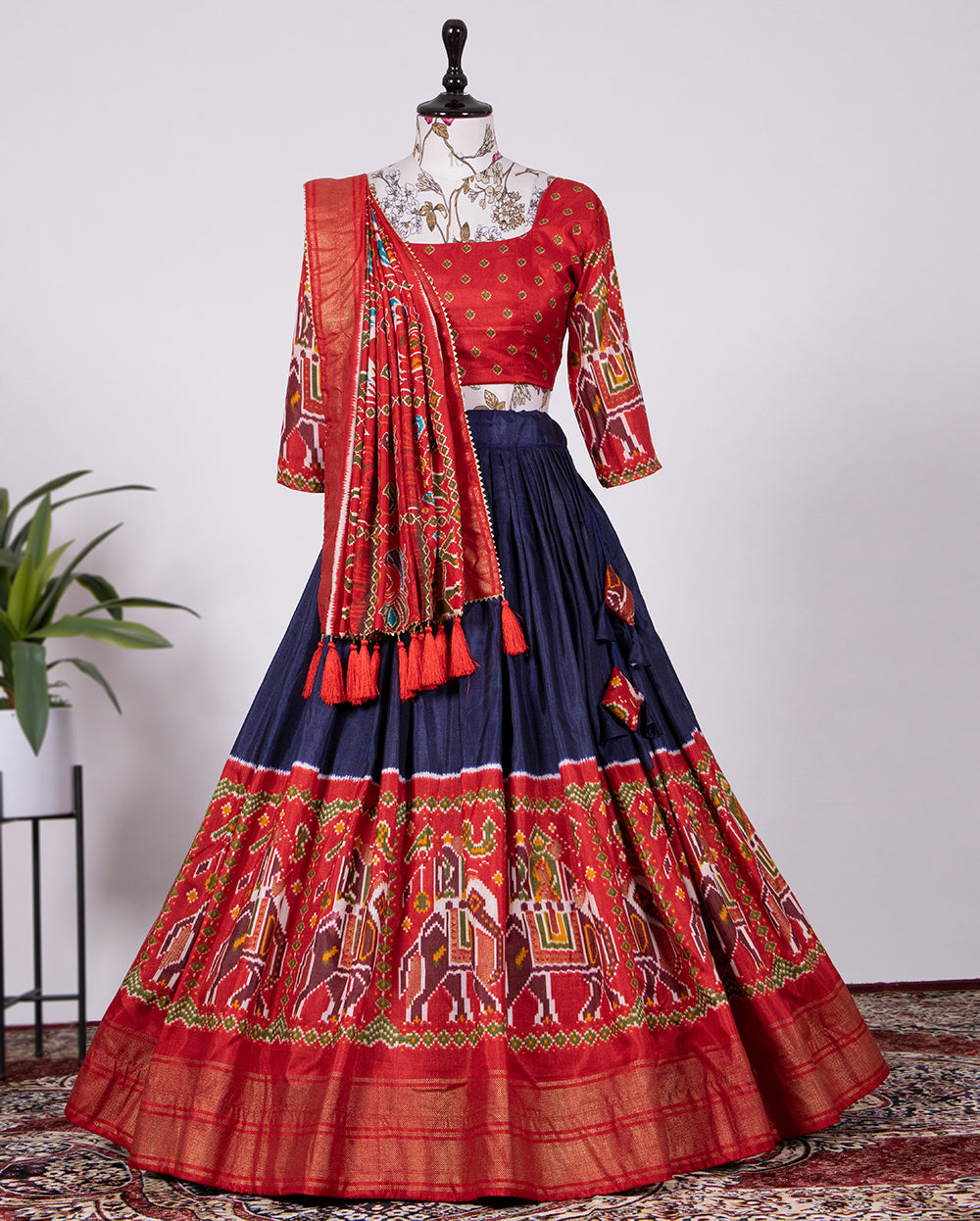 Nilaabha Navy Charisma Dola Silk Patola Print Lehenga Choli in Captivating Navy Blue