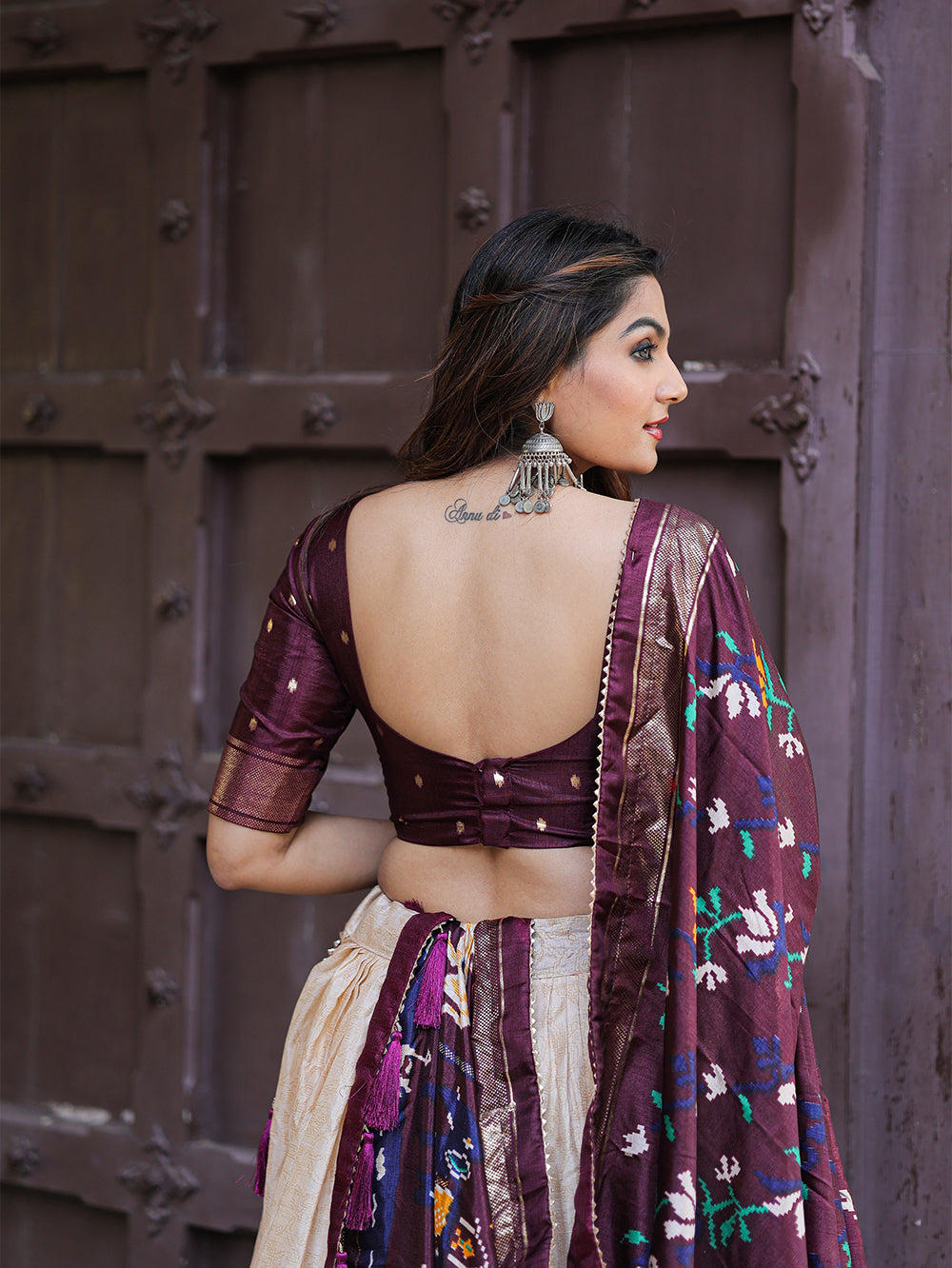 Roshni Rangoli: Radiant Wine Splendor Traditional Dola Silk Lehenga with Intricate Foil Work