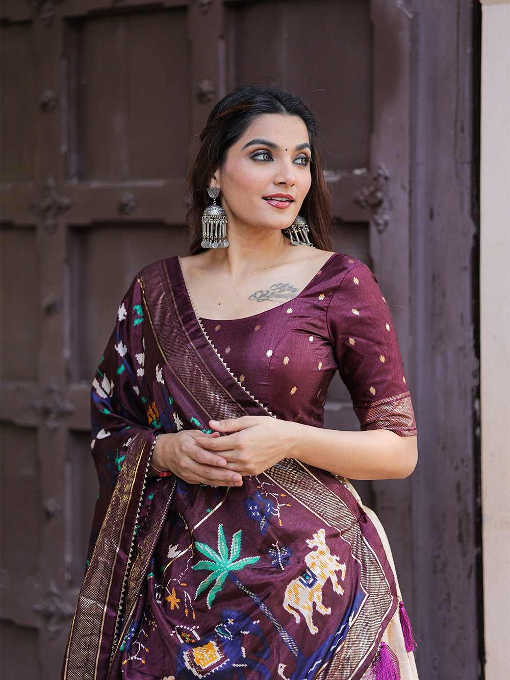 Roshni Rangoli: Radiant Wine Splendor Traditional Dola Silk Lehenga with Intricate Foil Work