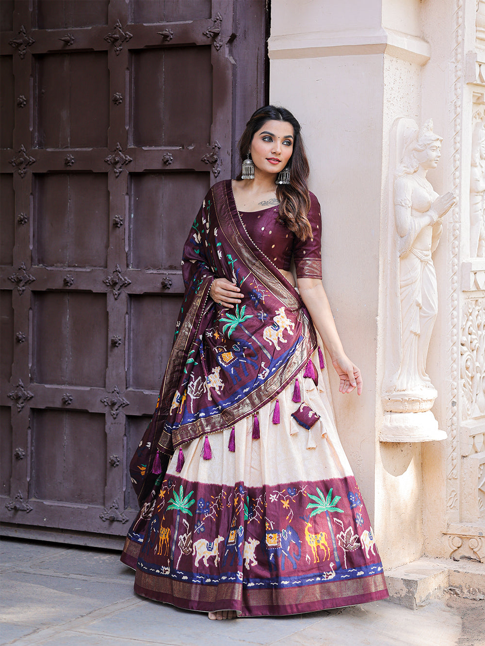 Roshni Rangoli: Radiant Wine Splendor Traditional Dola Silk Lehenga with Intricate Foil Work