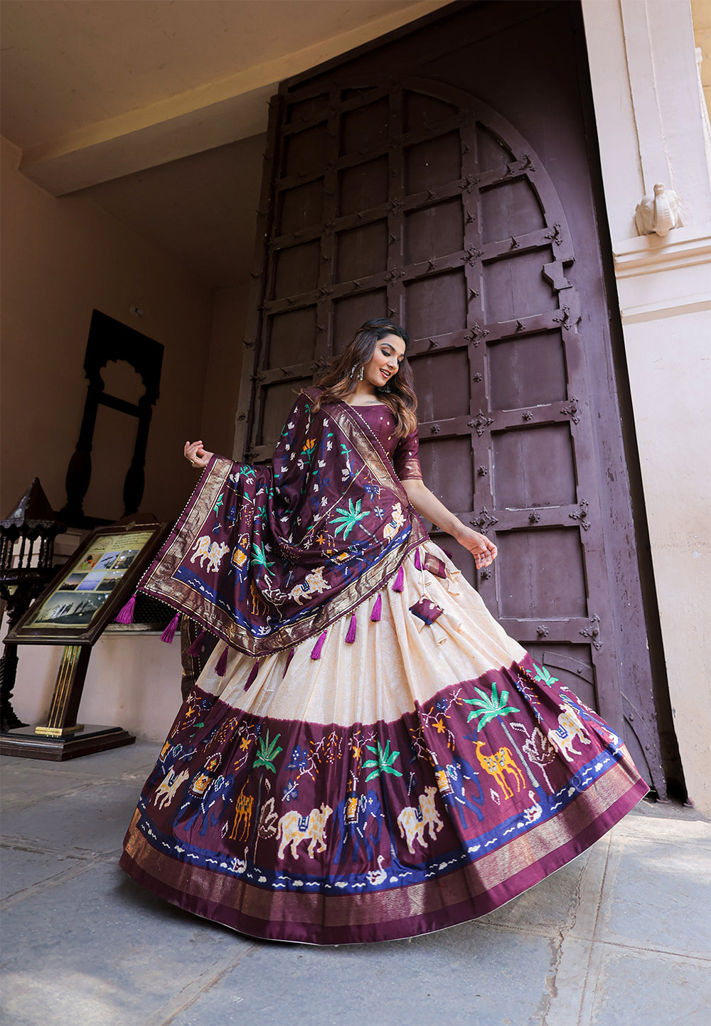 Roshni Rangoli: Radiant Wine Splendor Traditional Dola Silk Lehenga with Intricate Foil Work