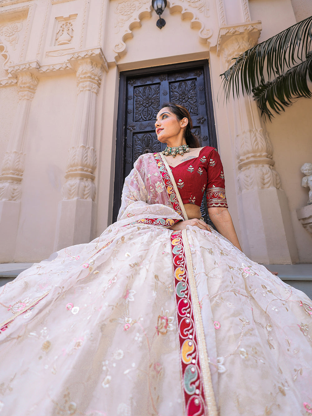 Ivory Whisper Exquisite Thread Embroidered Organza Lehenga Choli