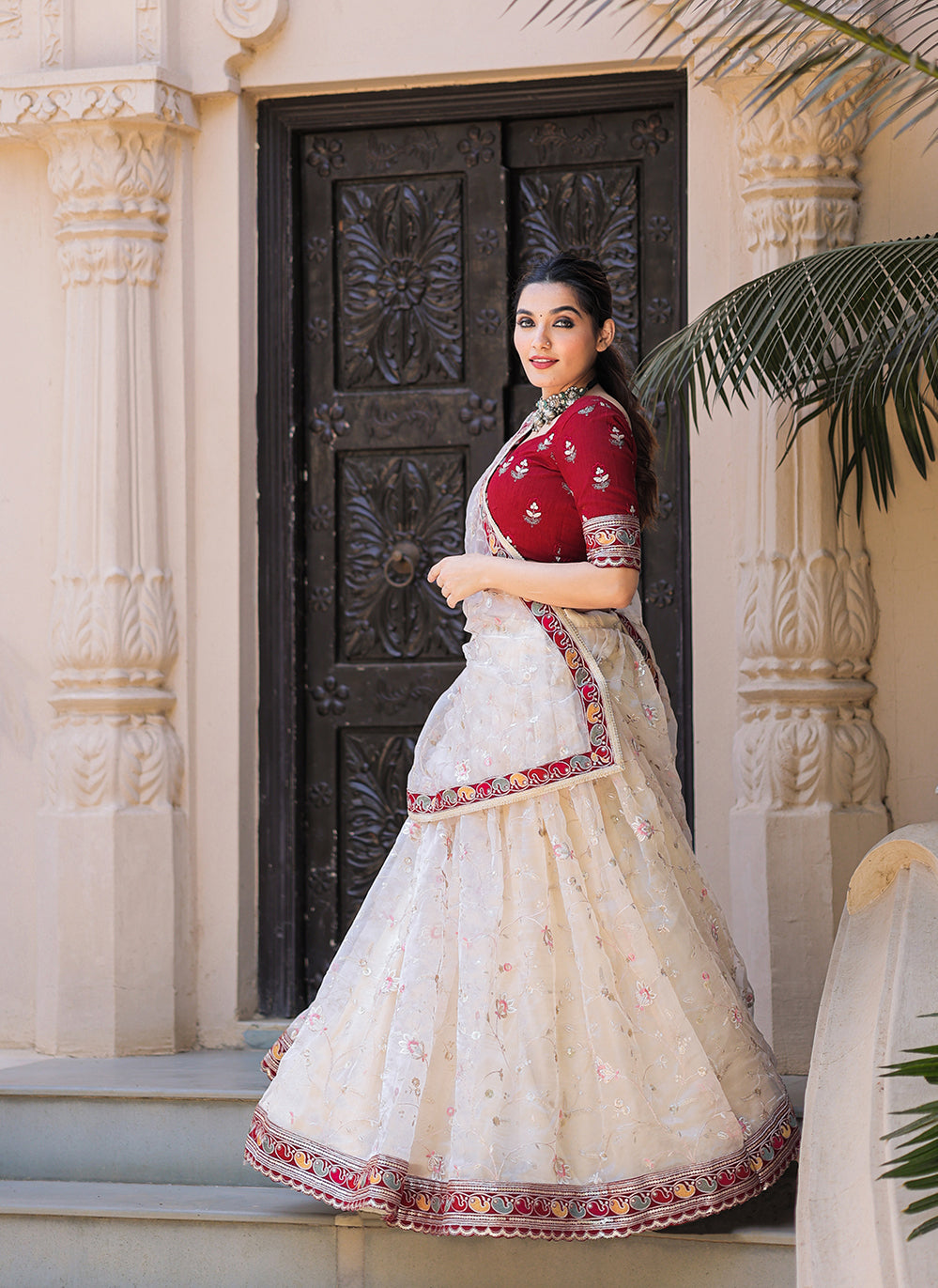 Ivory Whisper Exquisite Thread Embroidered Organza Lehenga Choli