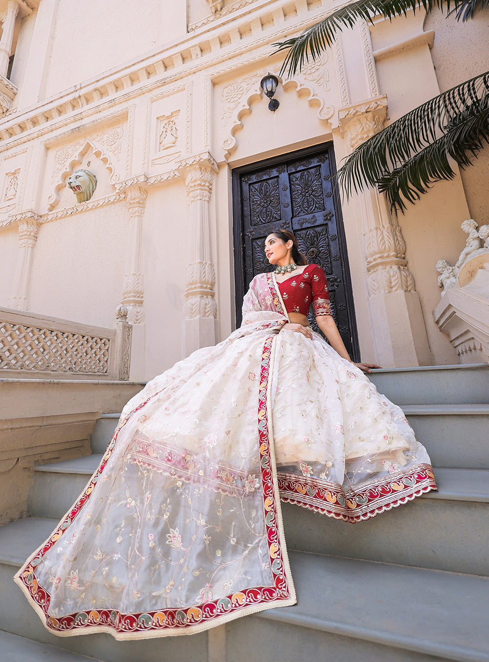 Ivory Whisper Exquisite Thread Embroidered Organza Lehenga Choli