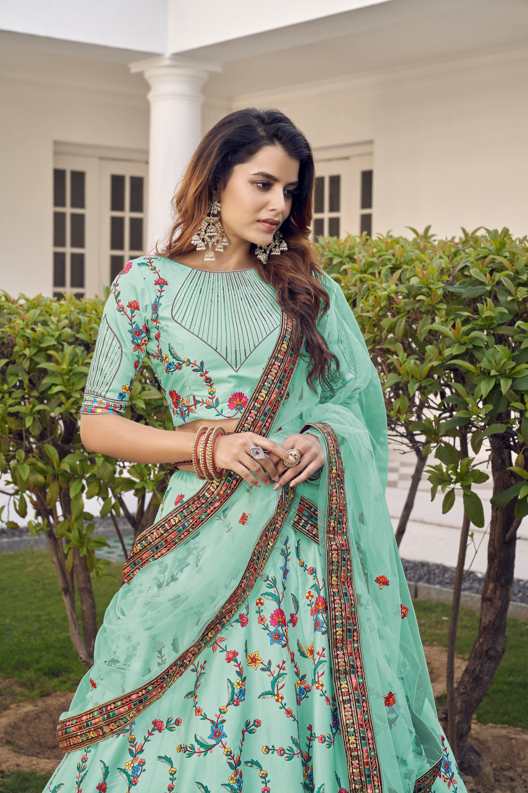 Pistachio Green Floral Silk Lehenga Choli with Intricate Thread Embroidery and Sequin Highlights