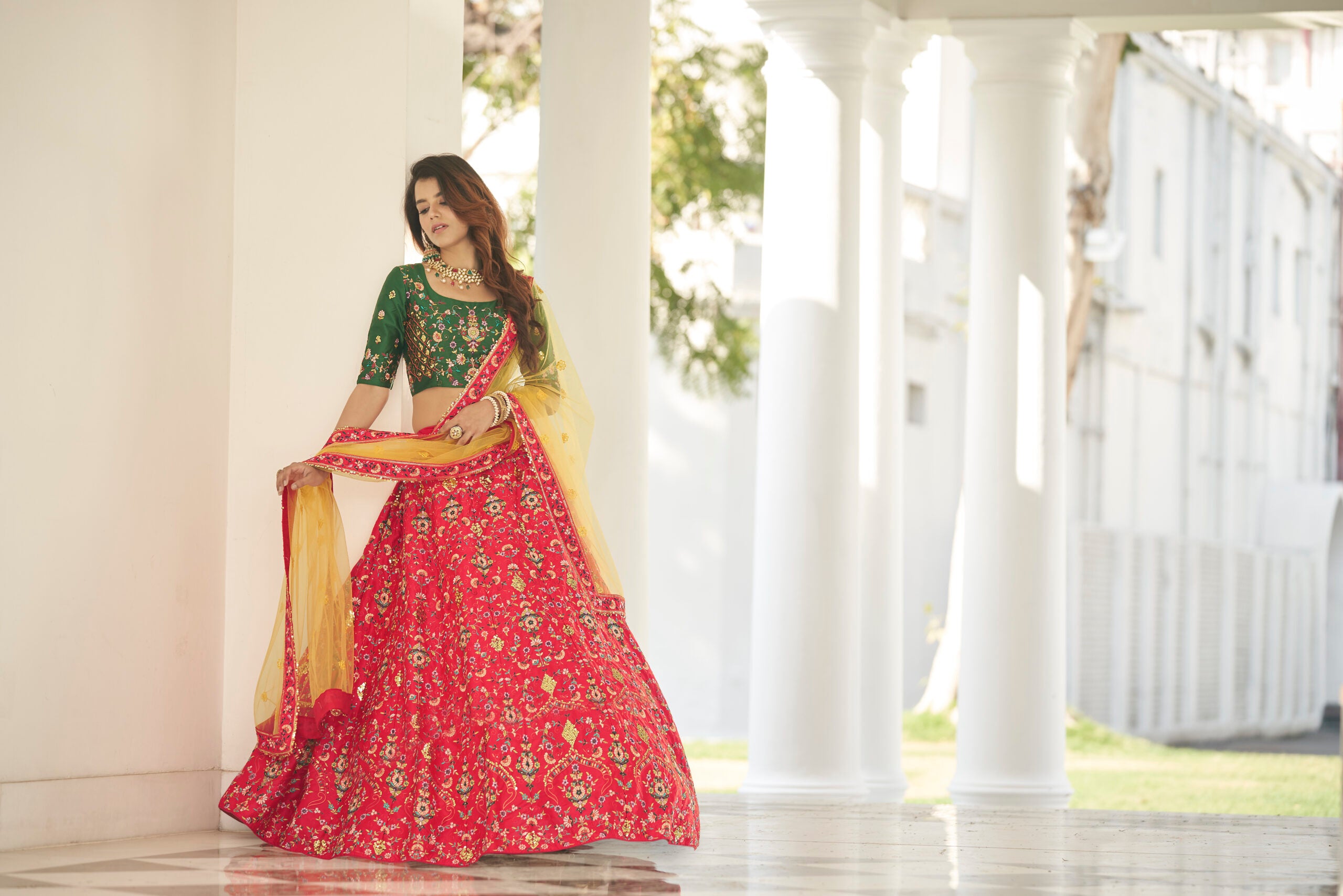 Red Silk Lehenga Choli with Embellished Sequin Embroidery and Artistic Threadwork