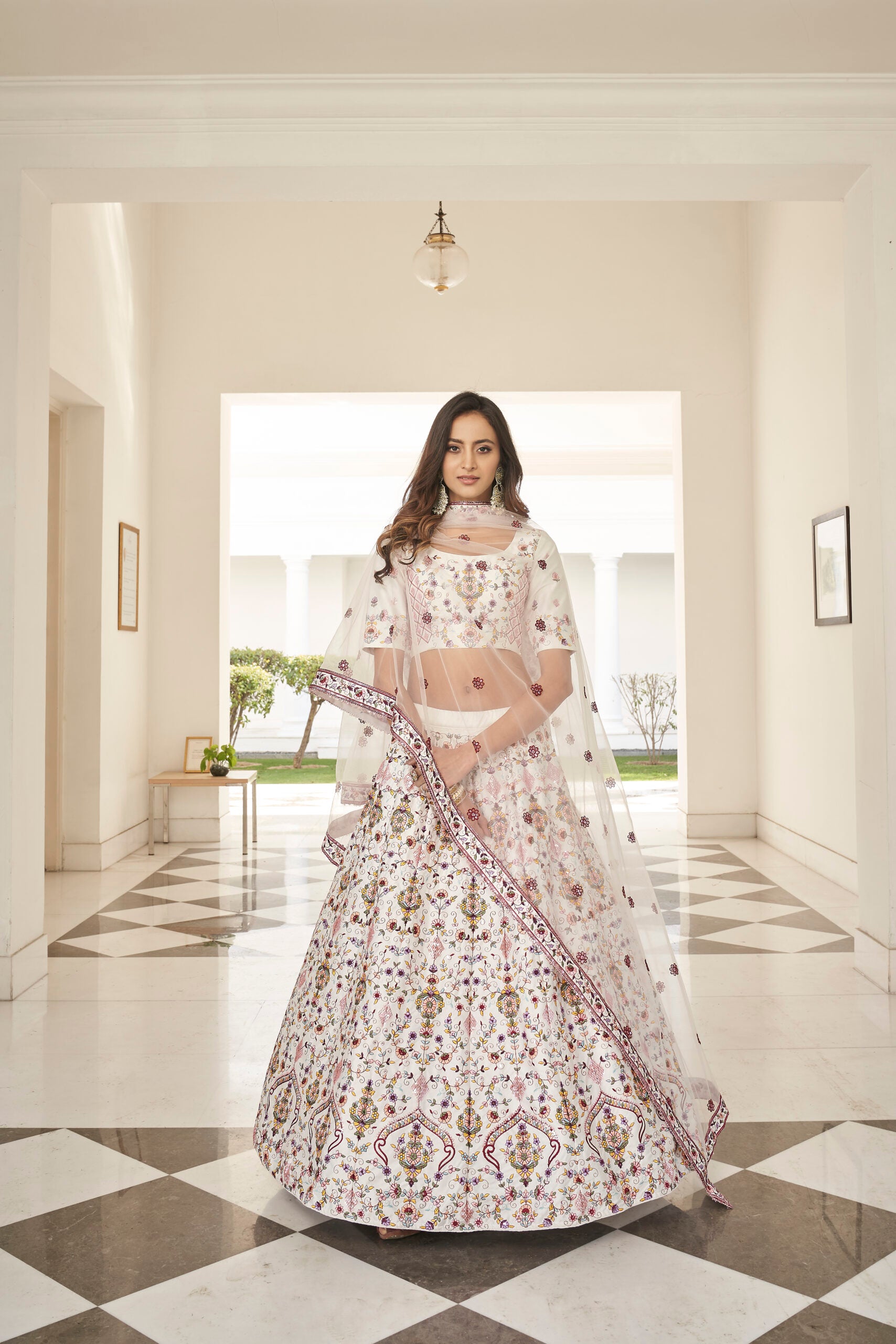 Divine Opulence White Silk Lehenga Choli with Exquisite Thread and Sequin Work