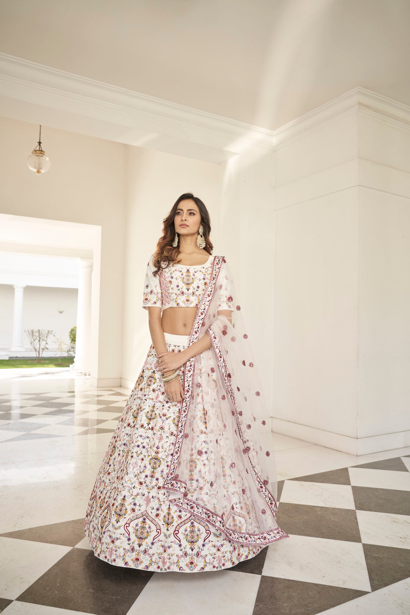 Divine Opulence White Silk Lehenga Choli with Exquisite Thread and Sequin Work