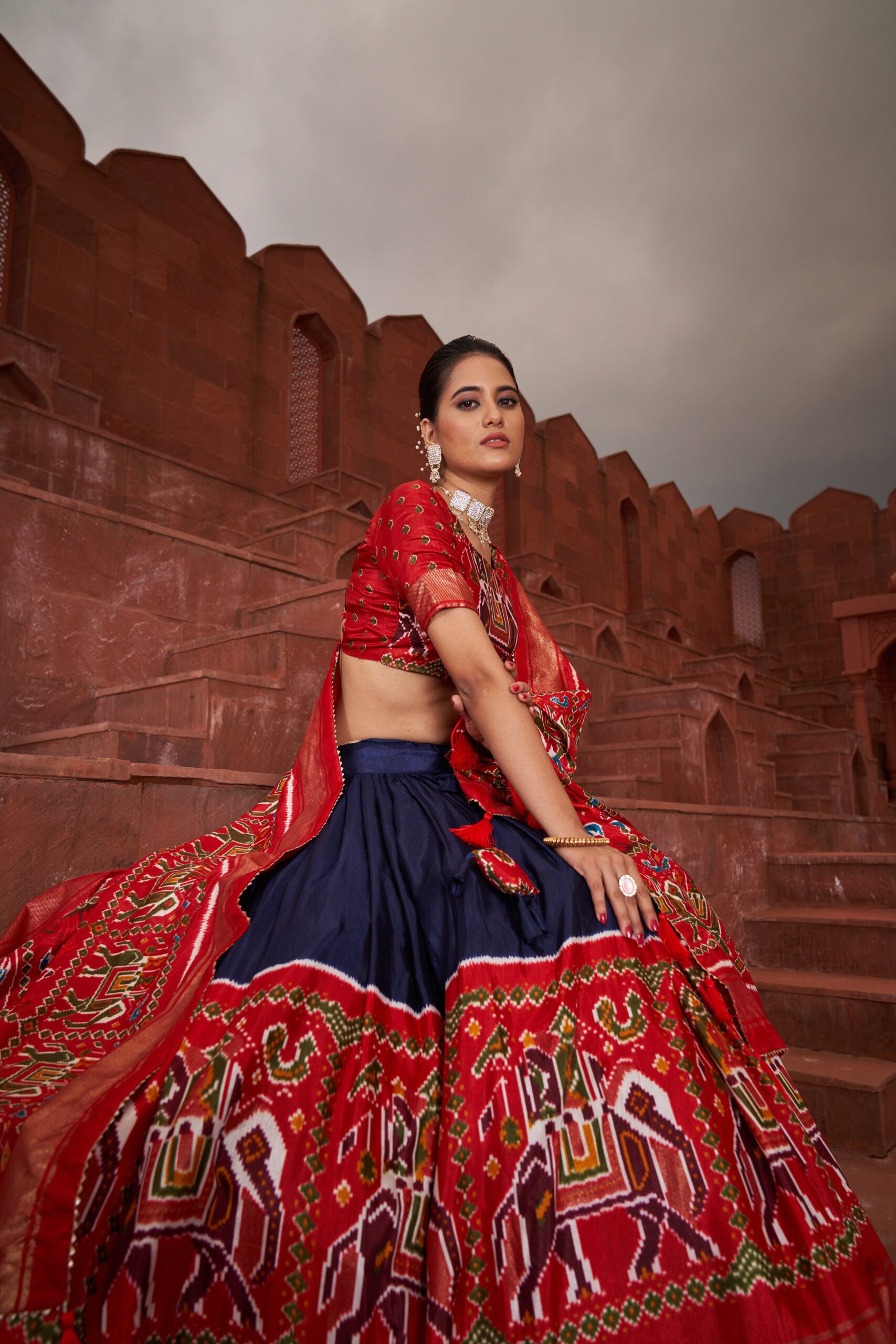 Nilaabha Navy Charisma Dola Silk Patola Print Lehenga Choli in Captivating Navy Blue