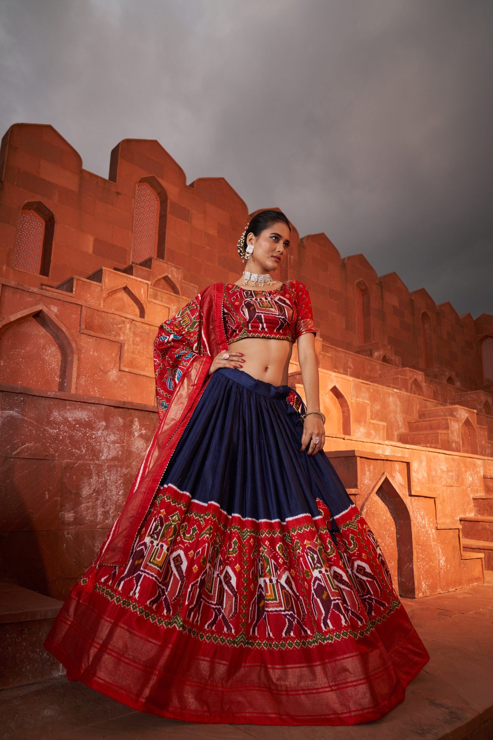 Nilaabha Navy Charisma Dola Silk Patola Print Lehenga Choli in Captivating Navy Blue
