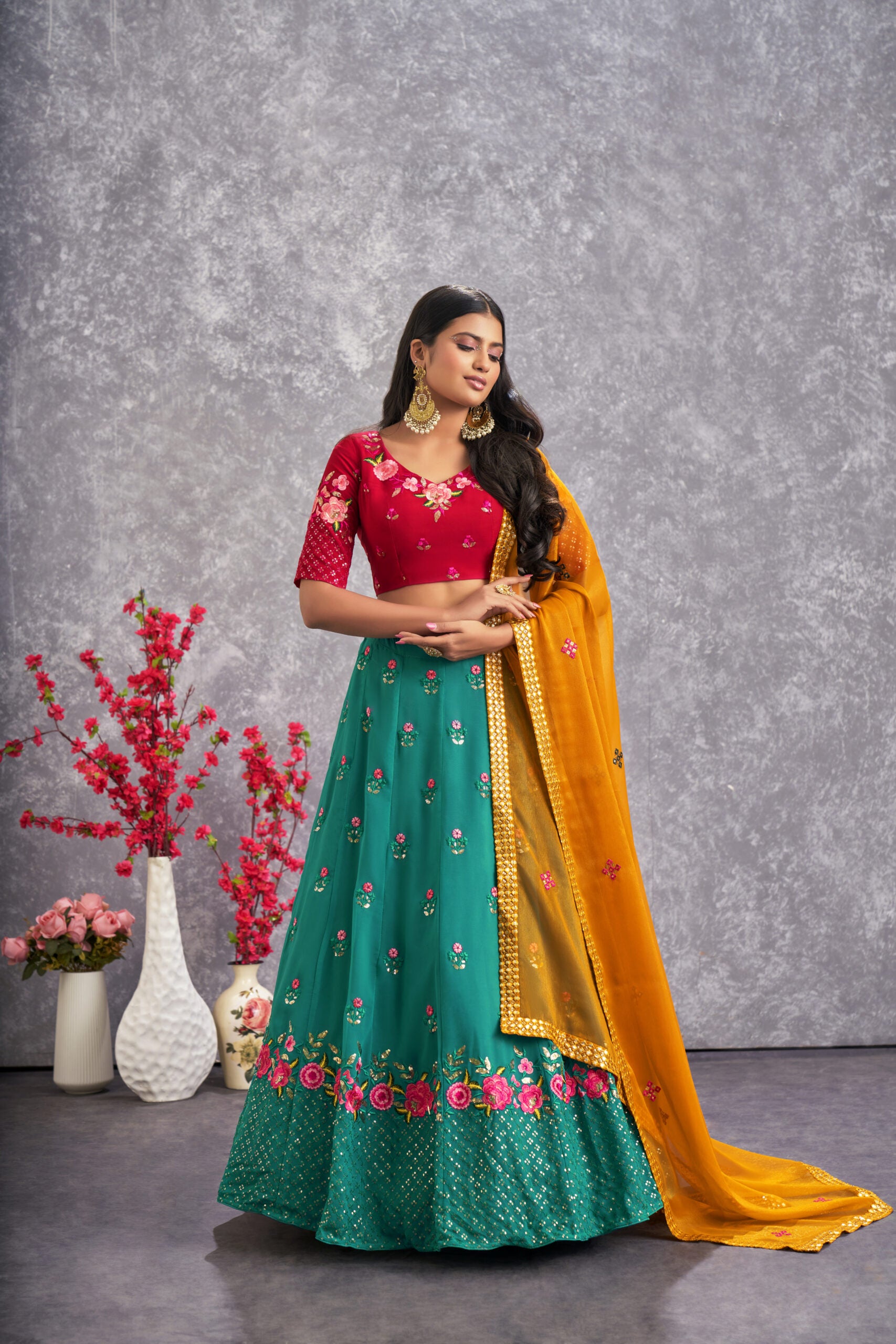 Floral Fantasy Vibrant Firozi Blue Georgette Lehenga Choli with Threadwork and Sequin Embroidery