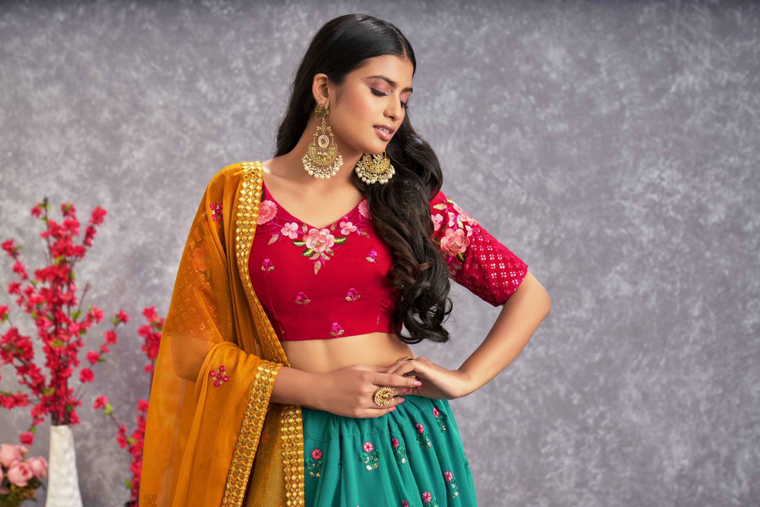 Floral Fantasy Vibrant Firozi Blue Georgette Lehenga Choli with Threadwork and Sequin Embroidery