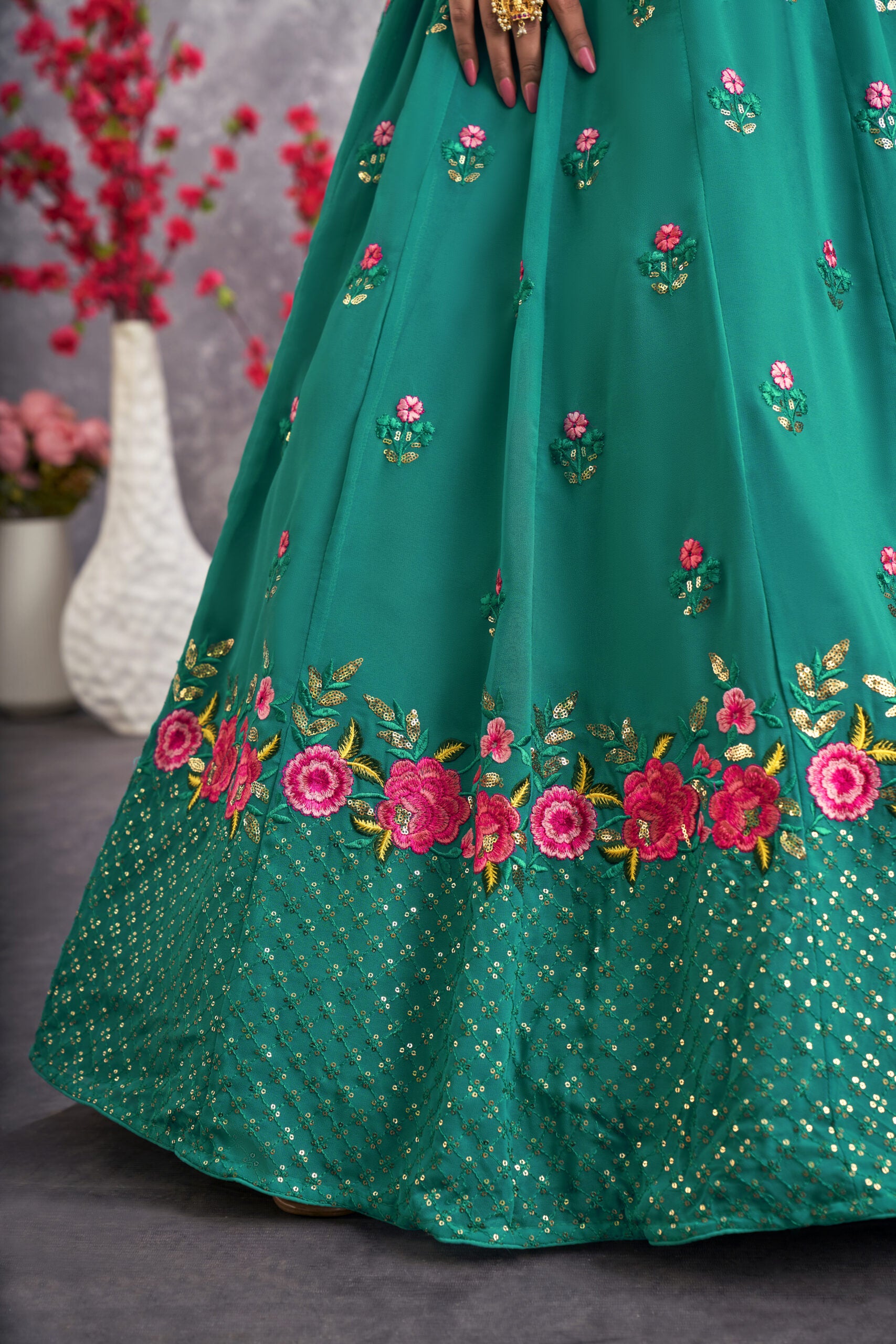 Floral Fantasy Vibrant Firozi Blue Georgette Lehenga Choli with Threadwork and Sequin Embroidery