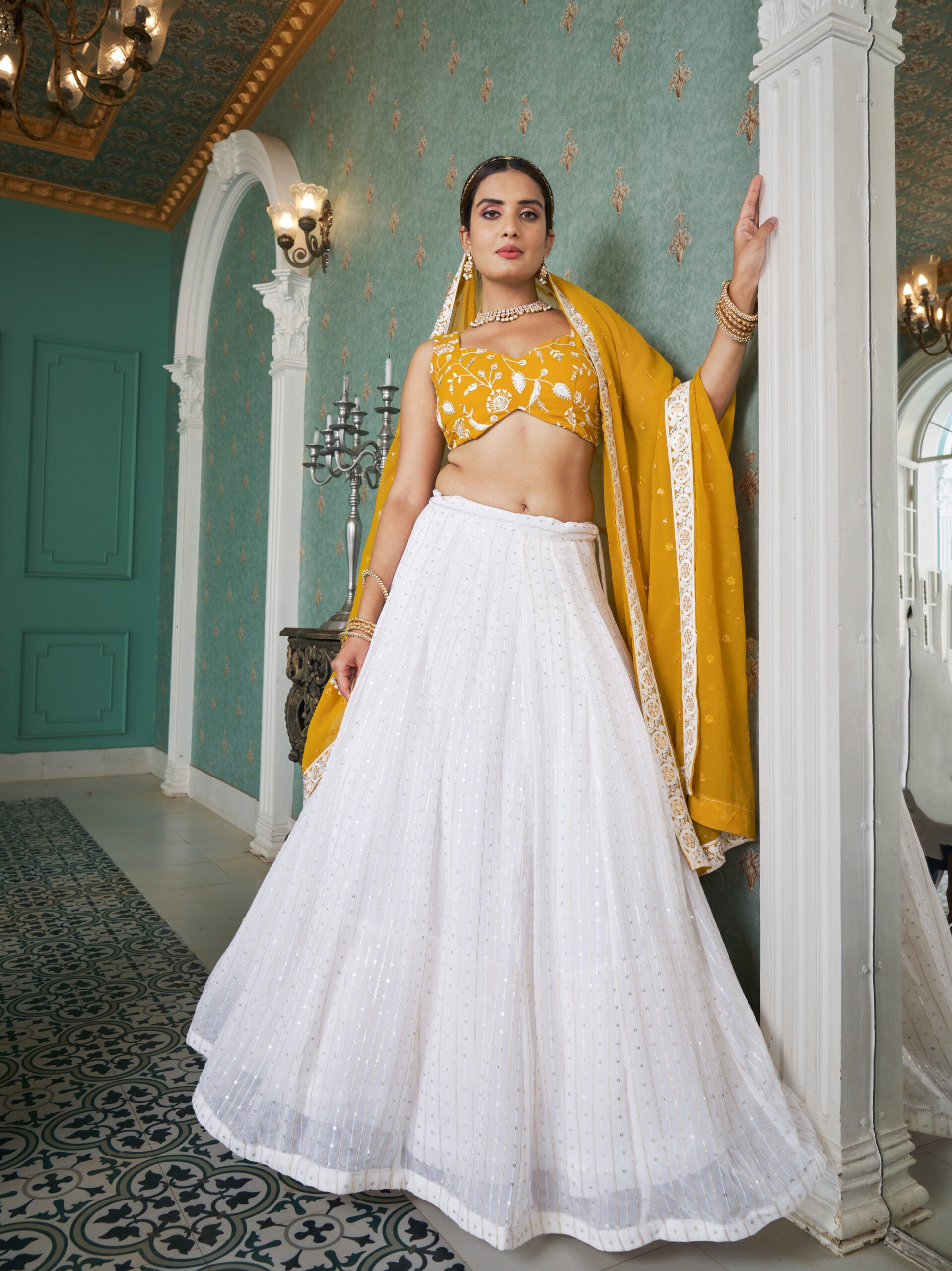 Gleaming Gold Threads Haldi Special Yellow Thread Embroidery and Sequin Lehenga Choli