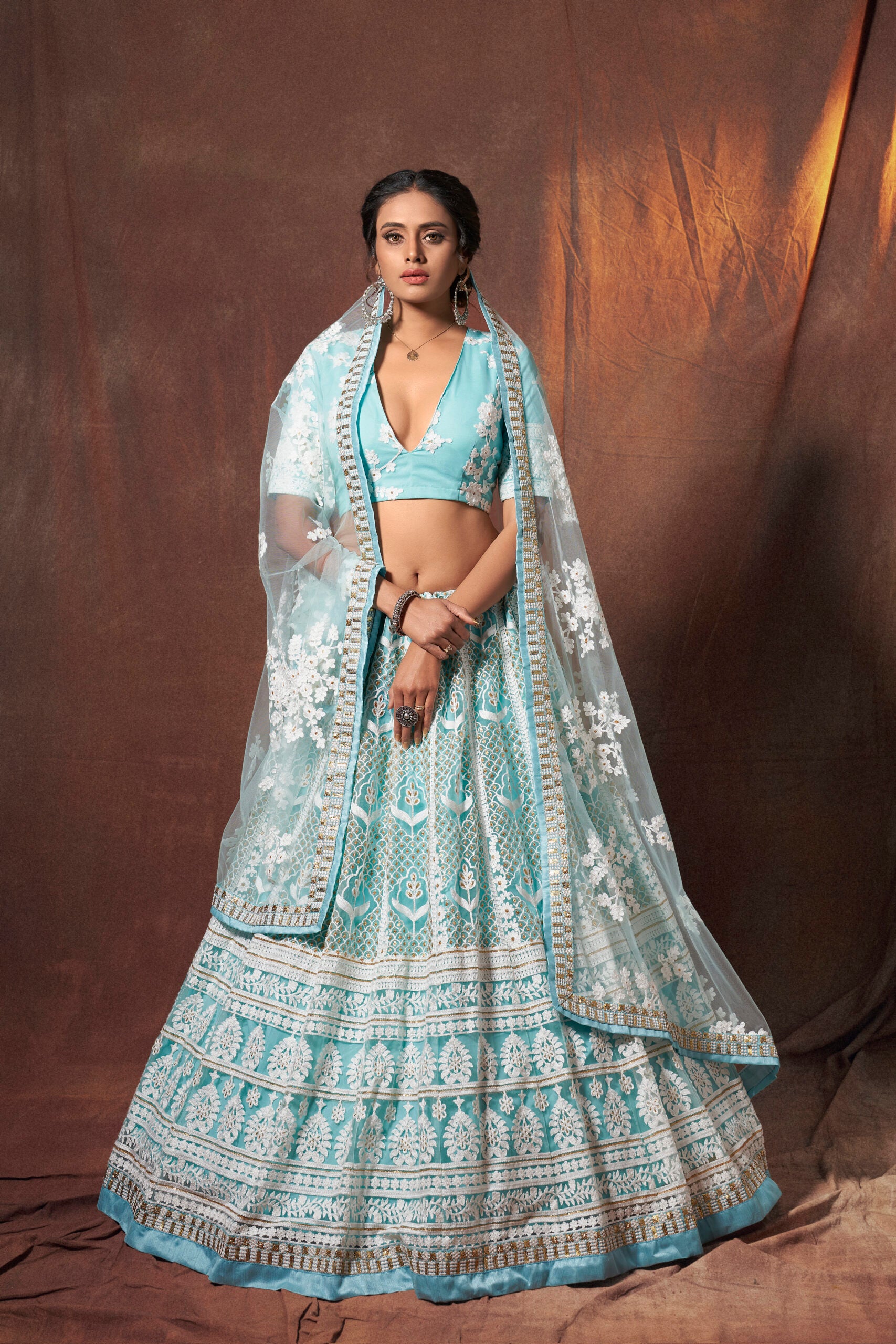 Turquoise Temptation Resham Net Lehenga