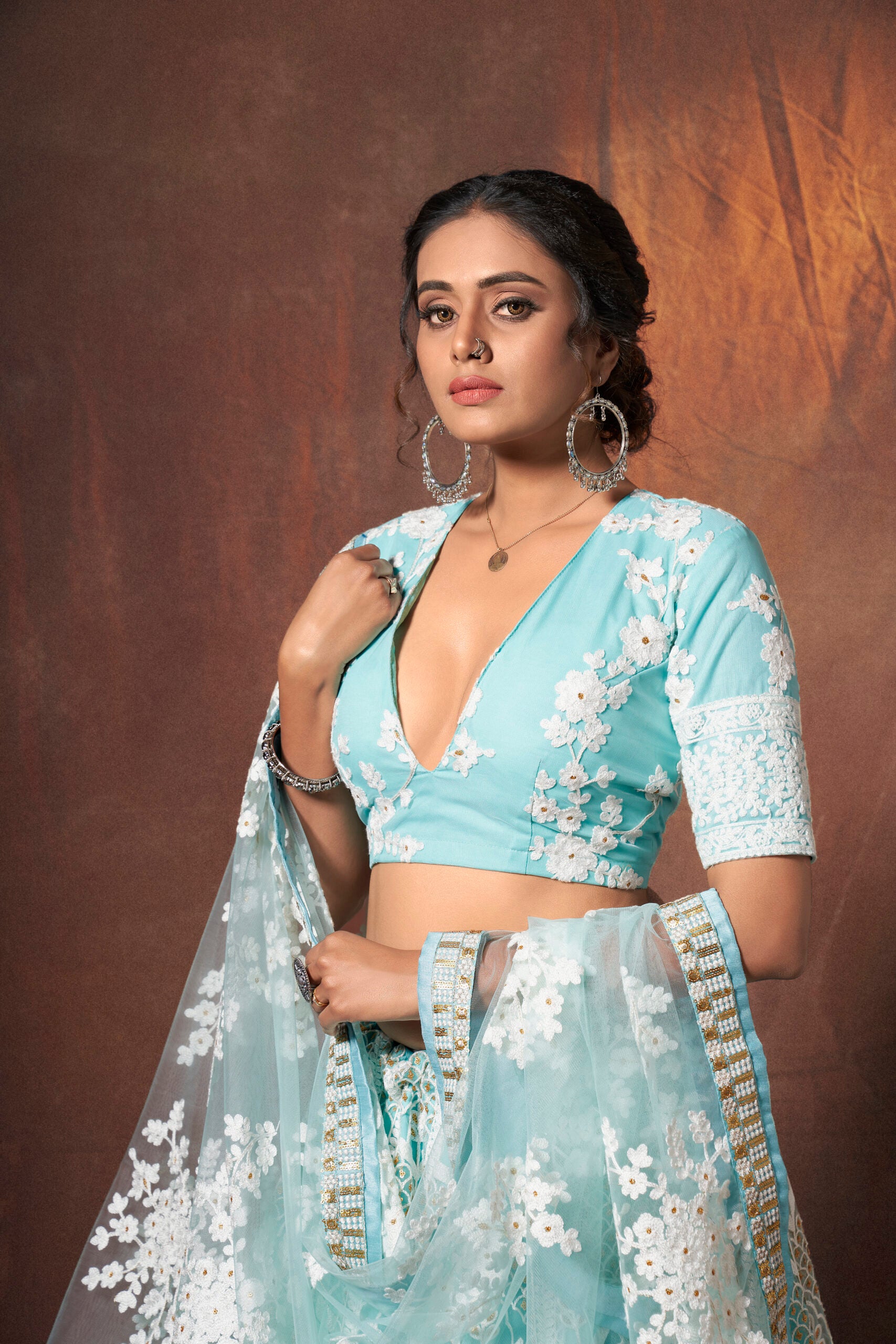 Turquoise Temptation Resham Net Lehenga