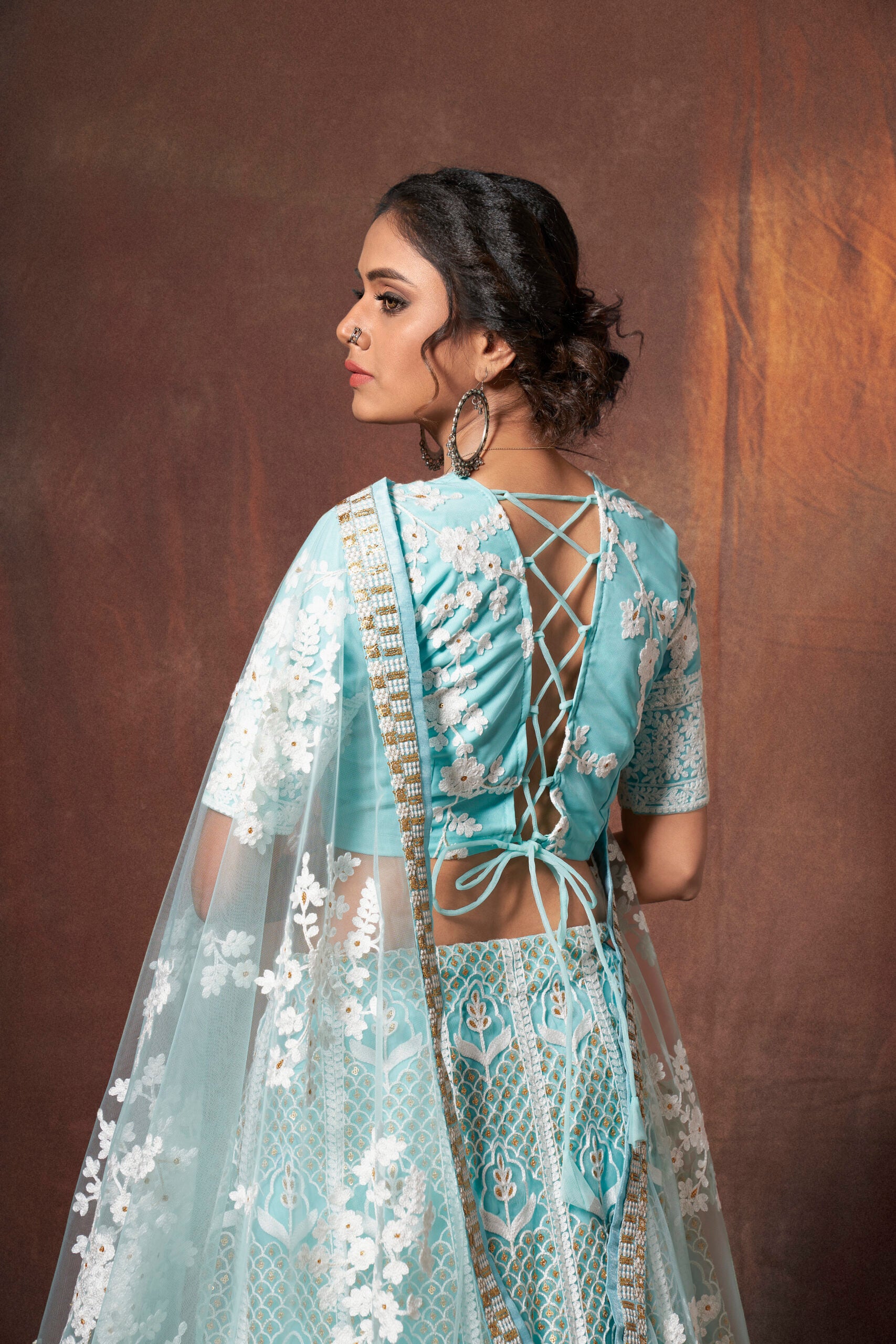 Turquoise Temptation Resham Net Lehenga