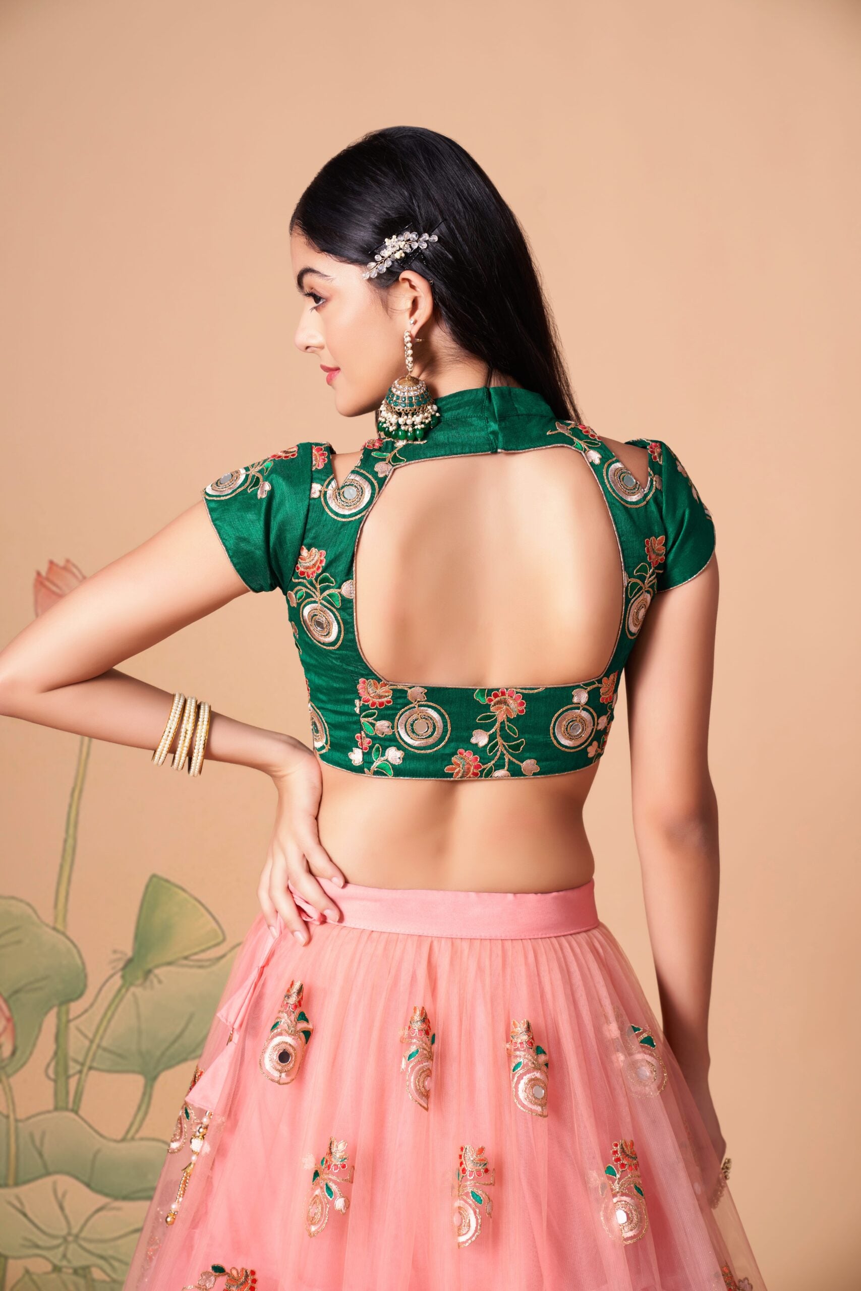 Peachy Elegance Sequin Threaded and Mirror-Adorned Lehenga Choli