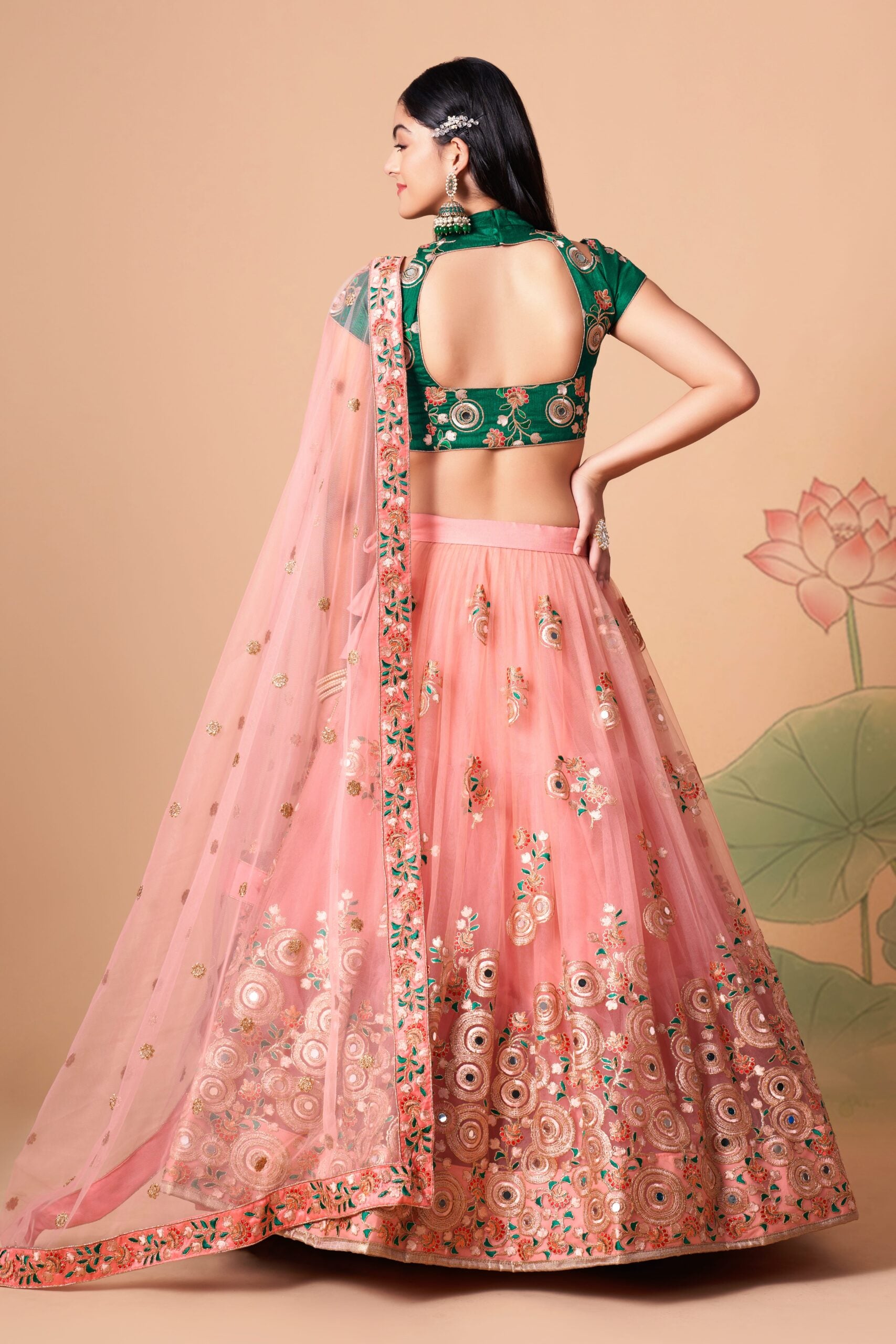 Peachy Elegance Sequin Threaded and Mirror-Adorned Lehenga Choli